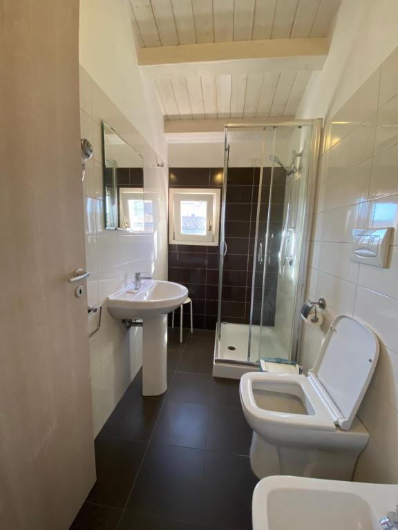 Koupelna v ubytování Plaza Rooms