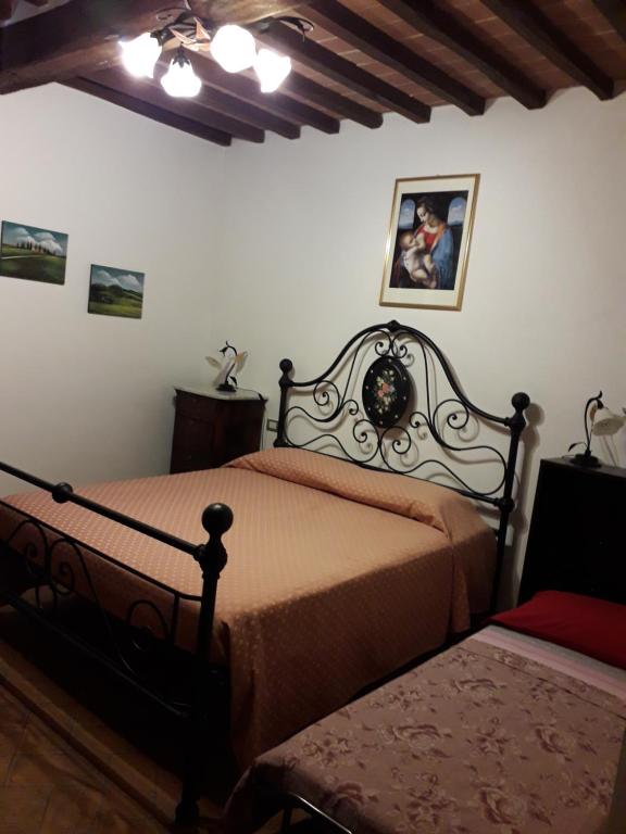 Postel nebo postele na pokoji v ubytování B&B Camere La Vite