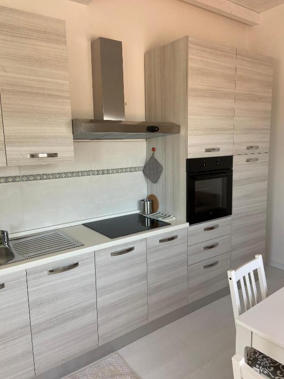 Kuchyň nebo kuchyňský kout v ubytování Residence Le Solane