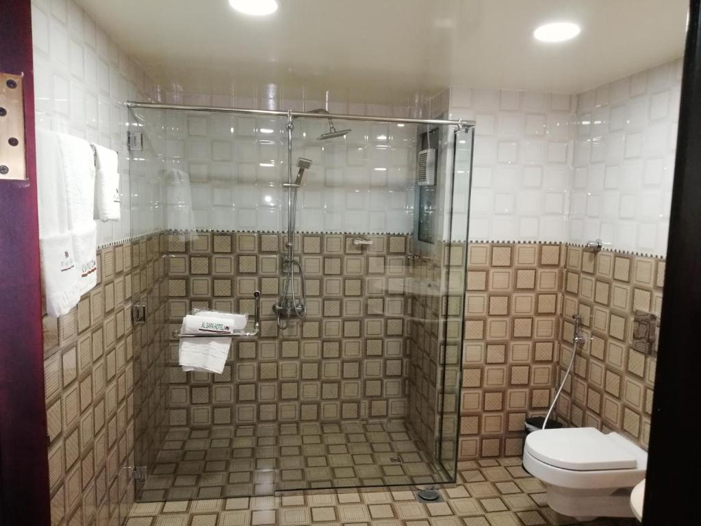 Koupelna v ubytování Alsafa Hotel