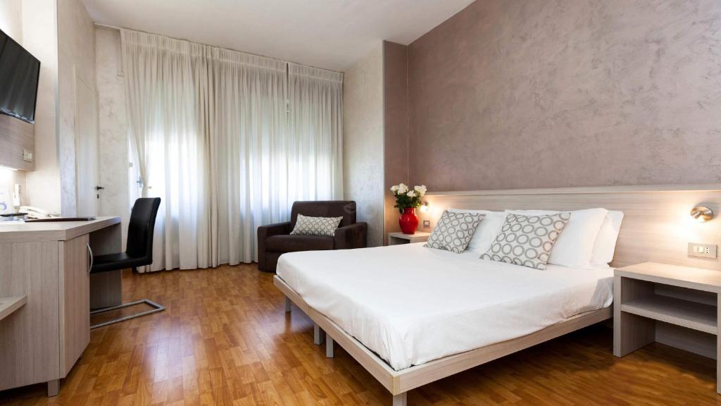 Postel nebo postele na pokoji v ubytování Hotel Lis