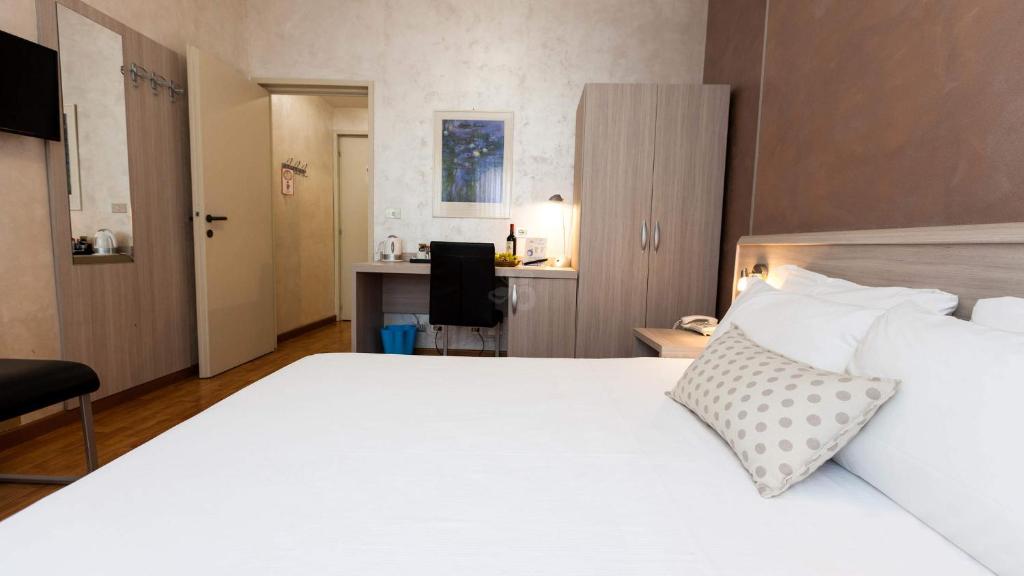 Postel nebo postele na pokoji v ubytování Hotel Lis