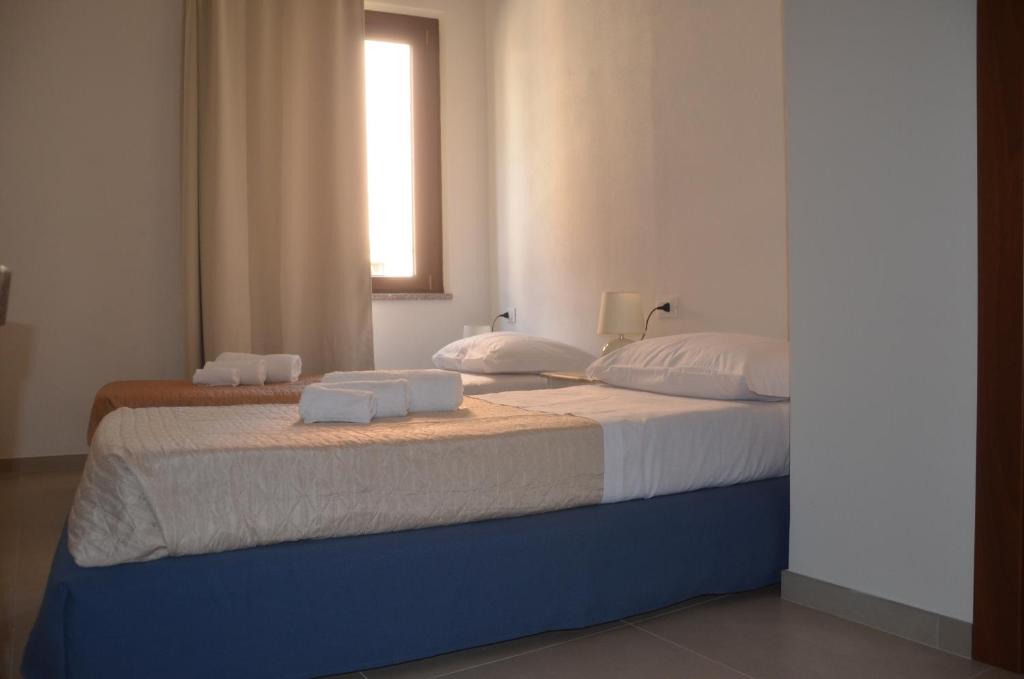 A bed or beds in a room at Belle Époque