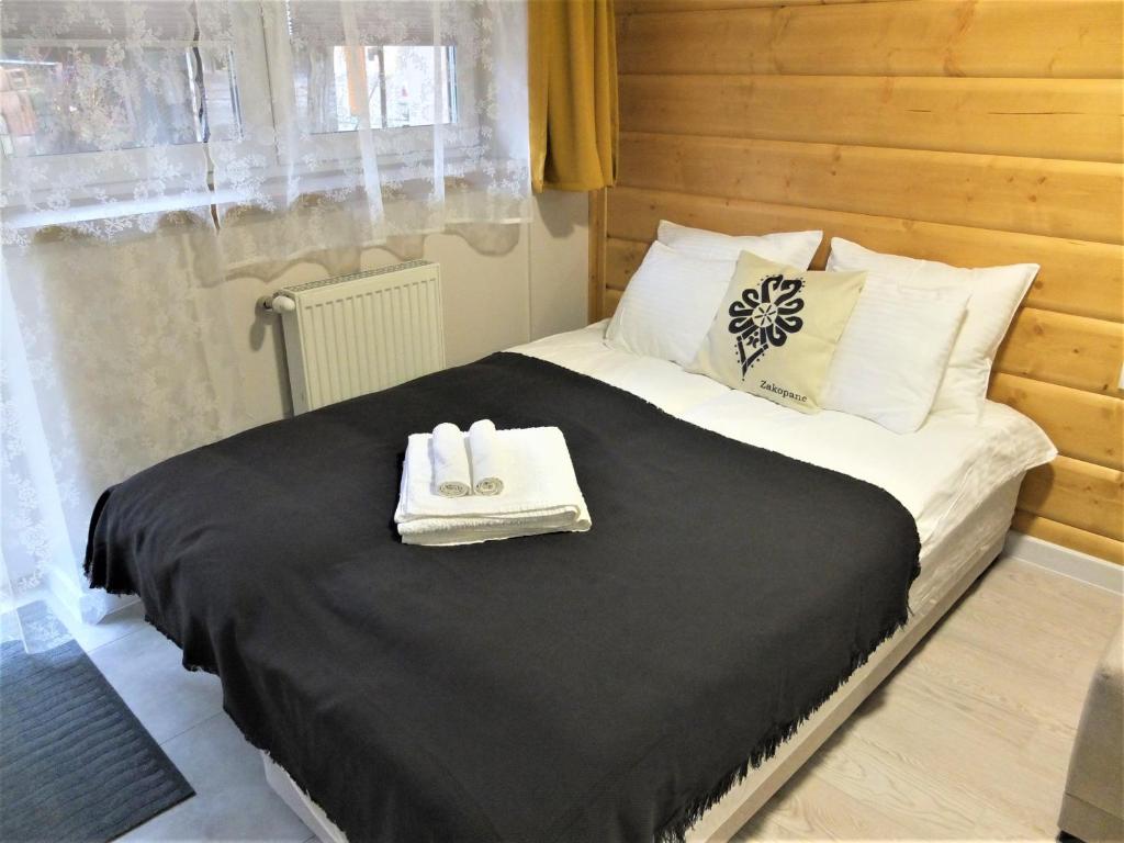 Postel nebo postele na pokoji v ubytování Apartamenty Milka