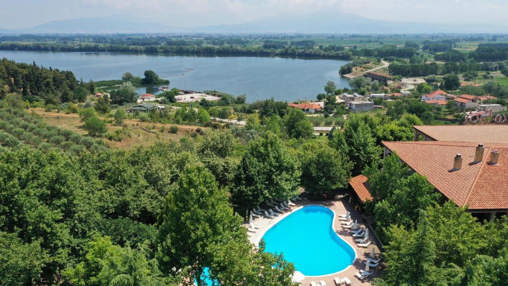 an aerial view of a resort with a swimming pool and a lake at Hotel Erodios in Lithótopos