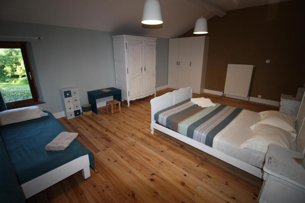 Postel nebo postele na pokoji v ubytování Chambre d'hotes de Jacobiel