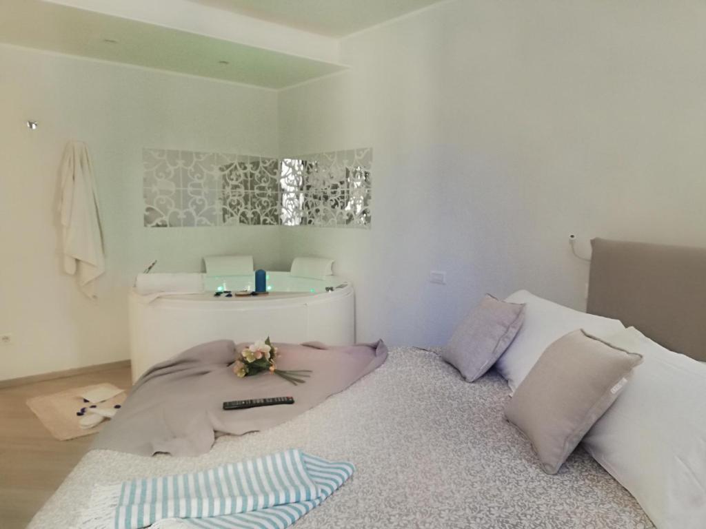 A bed or beds in a room at Blue House Varenna
