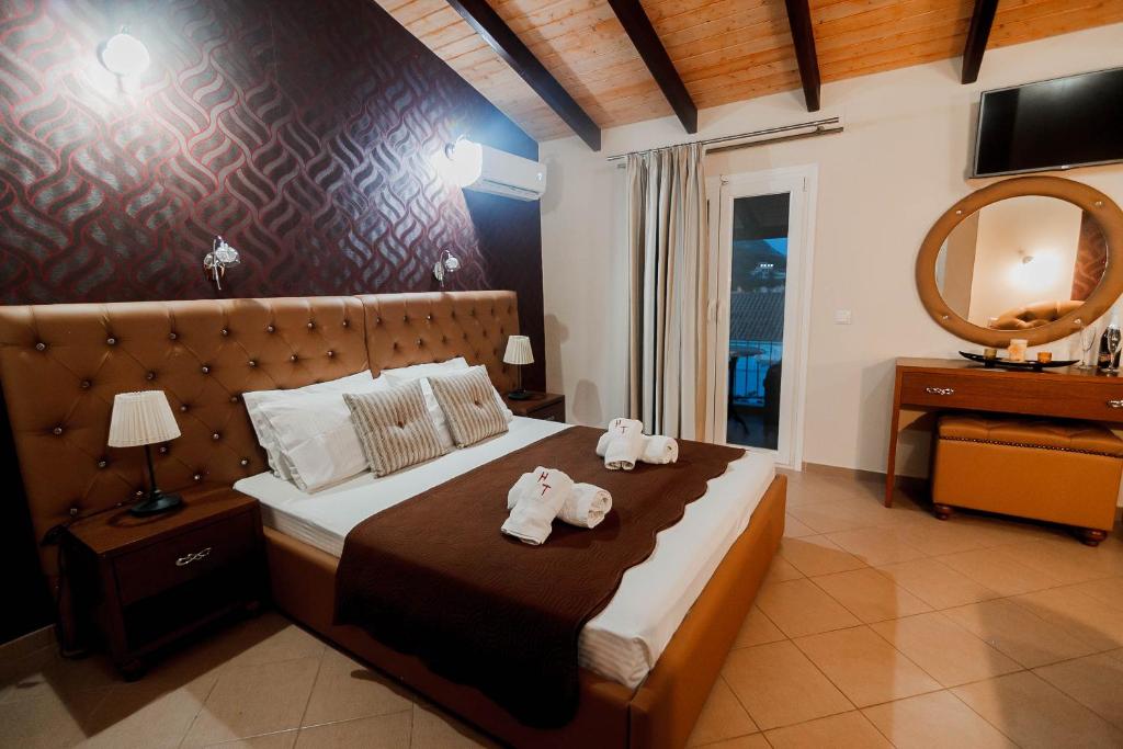 Postel nebo postele na pokoji v ubytování Hotel Torini