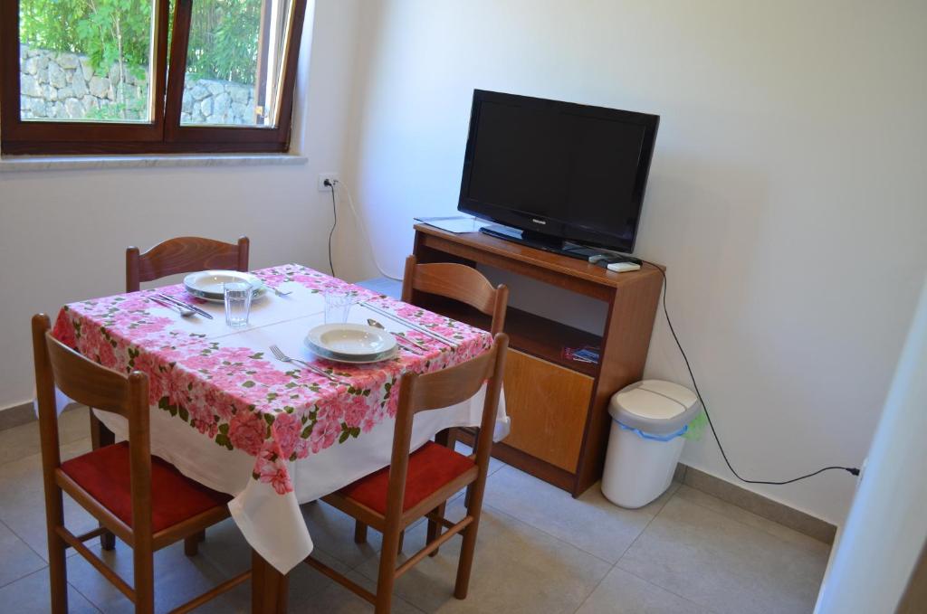 TV a/nebo společenská místnost v ubytování Apartments Mare