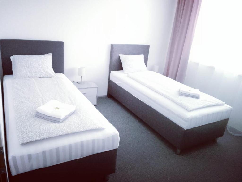 Łóżko lub łóżka w pokoju w obiekcie apartmán U Rané BOBULE