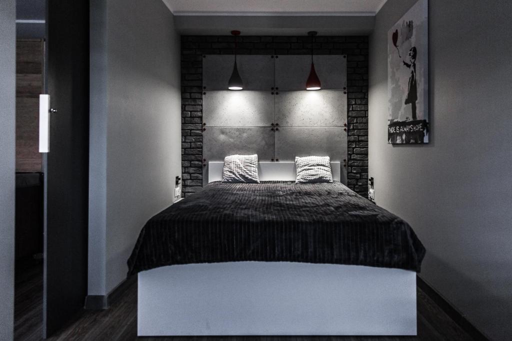Posteľ alebo postele v izbe v ubytovaní Apartament Chillout
