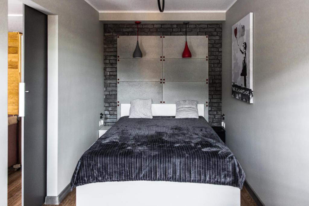 Posteľ alebo postele v izbe v ubytovaní Apartament Chillout