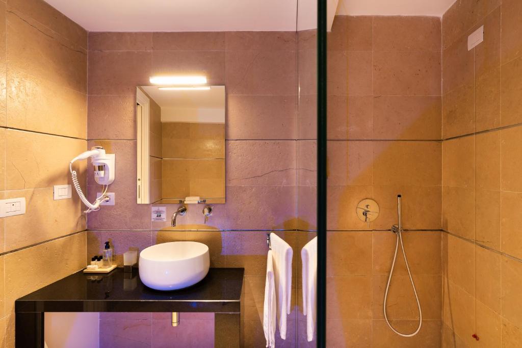Kúpeľňa v ubytovaní Re Dionisio Luxury Suites