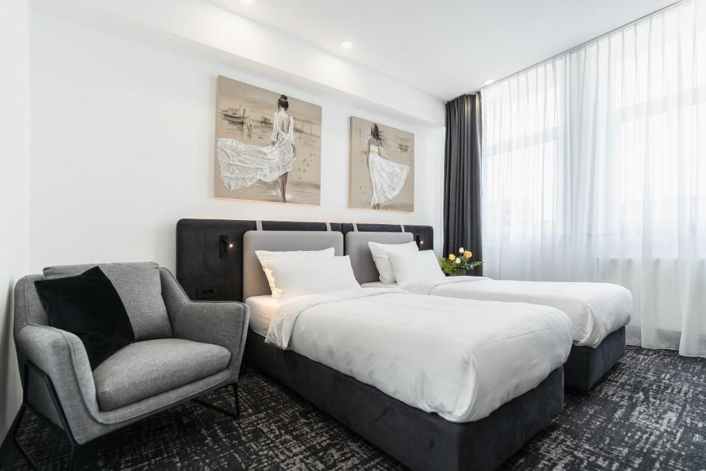 Postel nebo postele na pokoji v ubytování Libarty Hotels