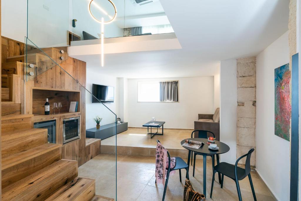 Posedenie v ubytovaní Re Dionisio Luxury Suites