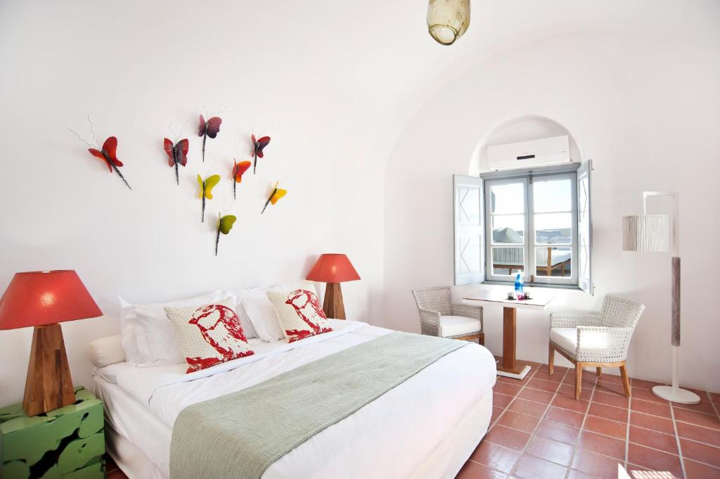 Łóżko lub łóżka w pokoju w obiekcie ANTELMI LUXURY VILLA