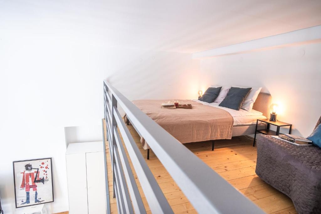 Posteľ alebo postele v izbe v ubytovaní Tower Street Apartments