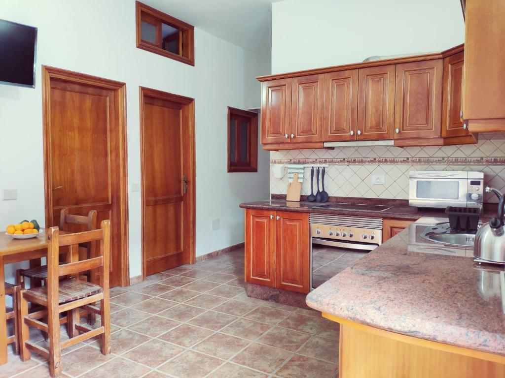 Kuchyňa alebo kuchynka v ubytovaní Casas Blancas -Suites 2y3- R E L A X