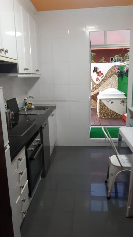 Kuchyň nebo kuchyňský kout v ubytování apartamento centrico cambados