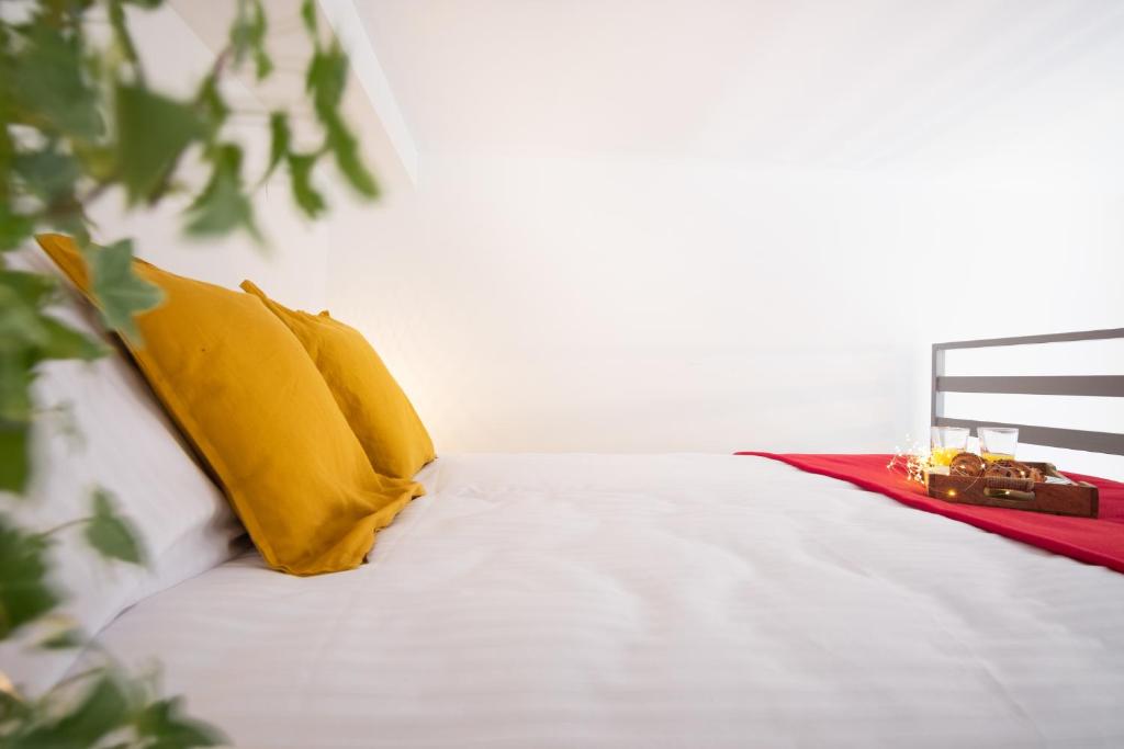 Posteľ alebo postele v izbe v ubytovaní Tower Street Apartments