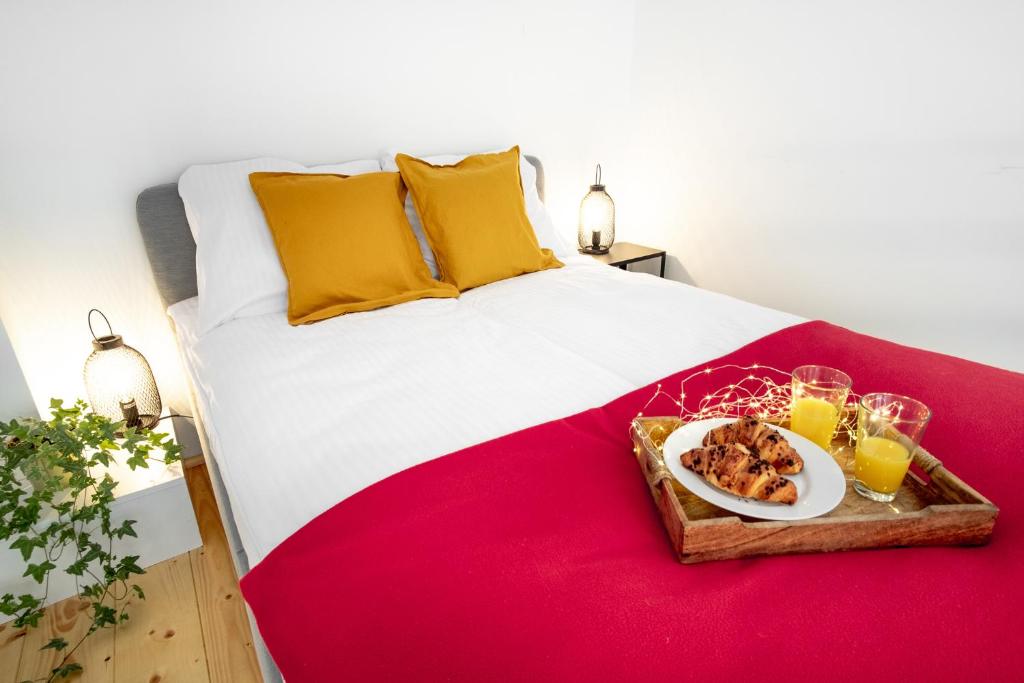 Posteľ alebo postele v izbe v ubytovaní Tower Street Apartments