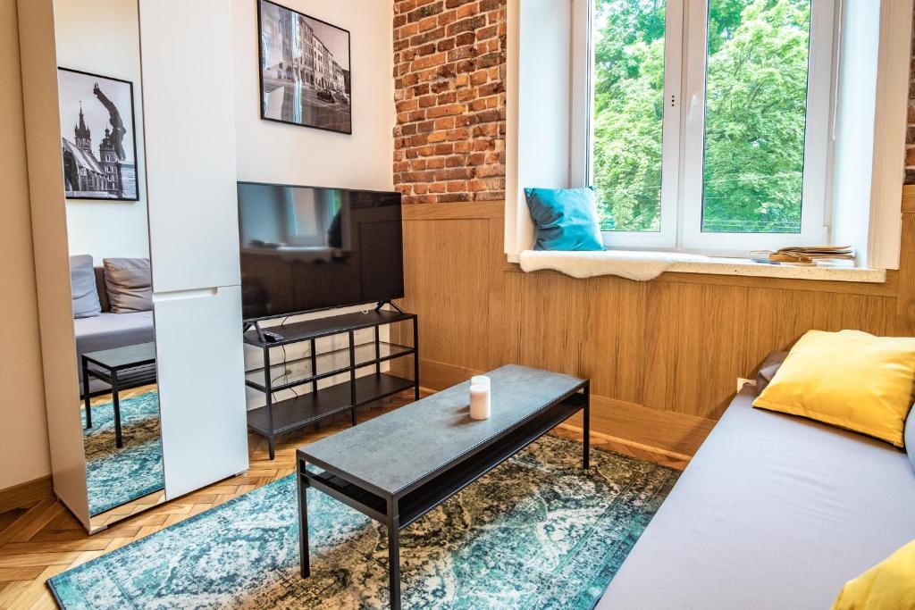 Televízia a/alebo spoločenská miestnosť v ubytovaní Tower Street Apartments
