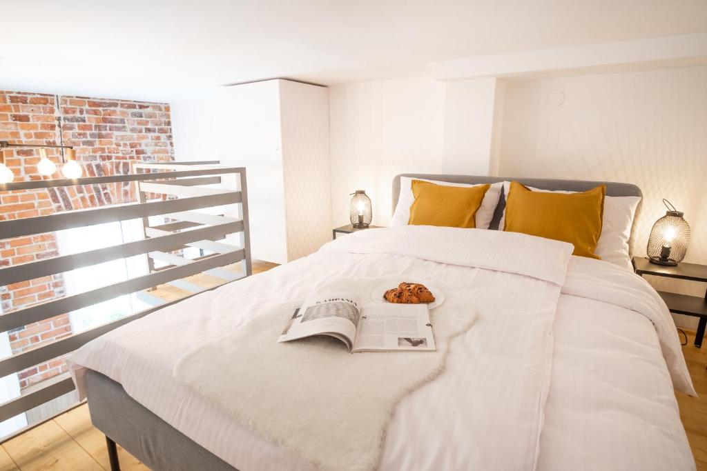 Posteľ alebo postele v izbe v ubytovaní Tower Street Apartments