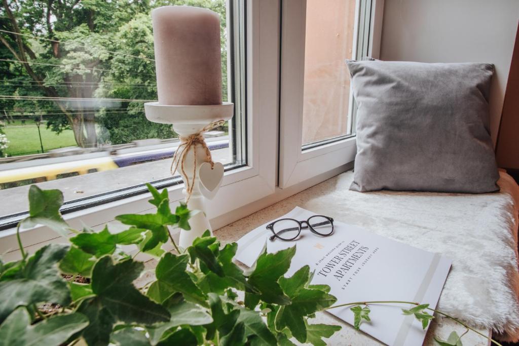 Posteľ alebo postele v izbe v ubytovaní Tower Street Apartments