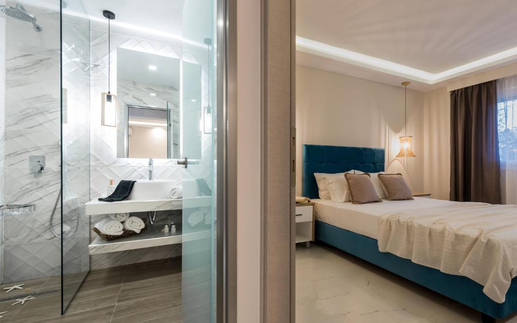 Posteľ alebo postele v izbe v ubytovaní Margaritari Apartments