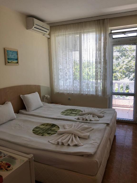 Postel nebo postele na pokoji v ubytování Borko Guest House
