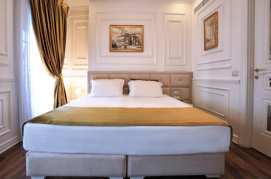 Postel nebo postele na pokoji v ubytování Eler Hotel