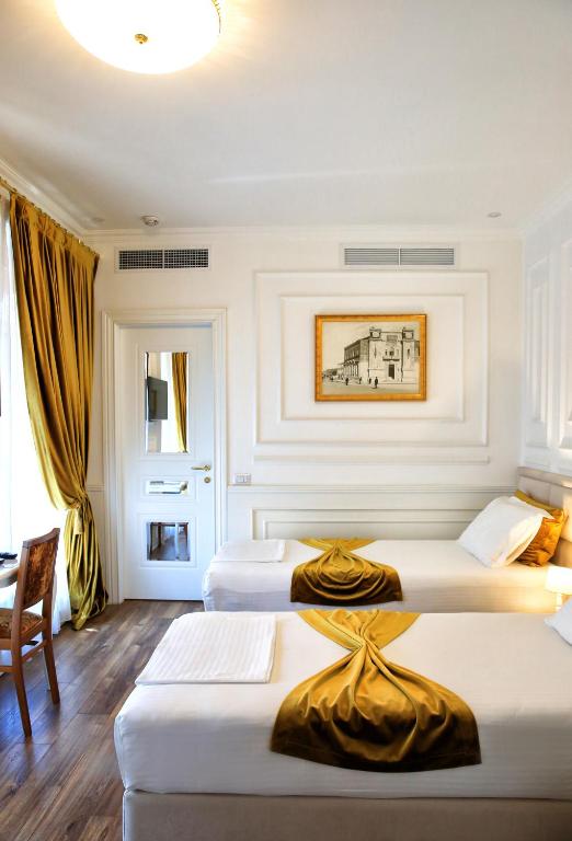 Postel nebo postele na pokoji v ubytování Eler Hotel