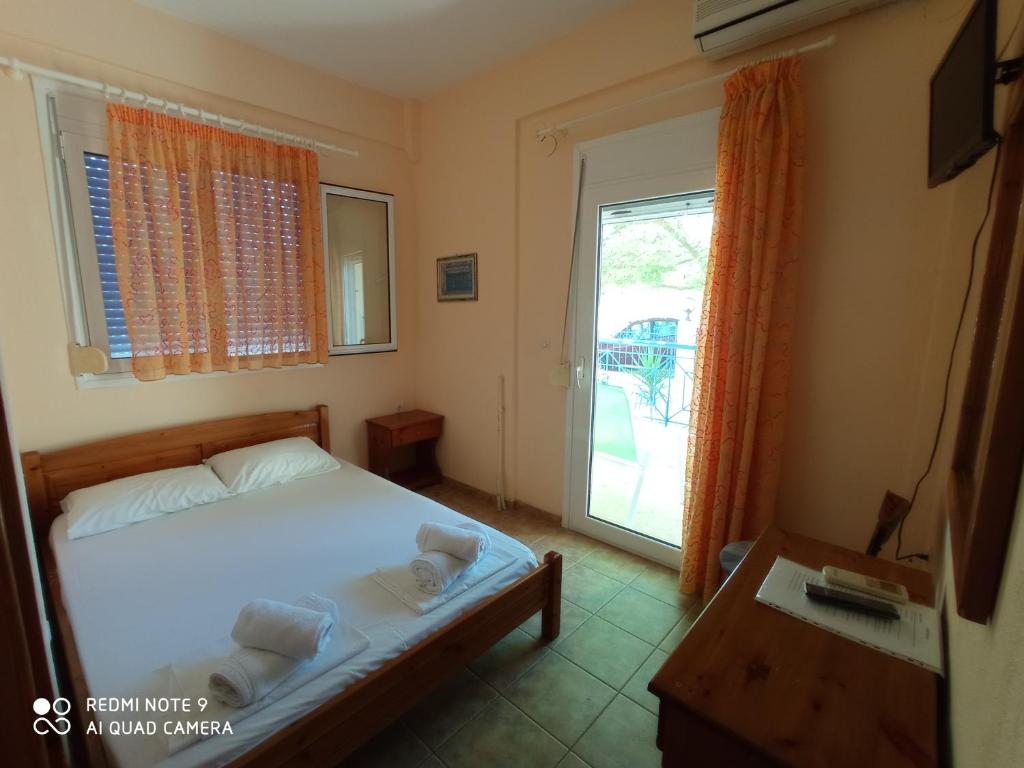 Postel nebo postele na pokoji v ubytování Hotel Giorgio