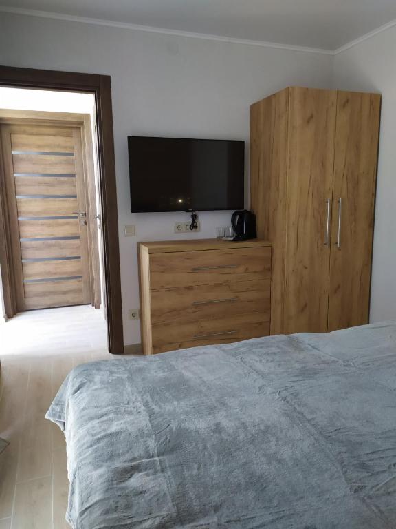 Postel nebo postele na pokoji v ubytování Aquapark Koblevo Hotel