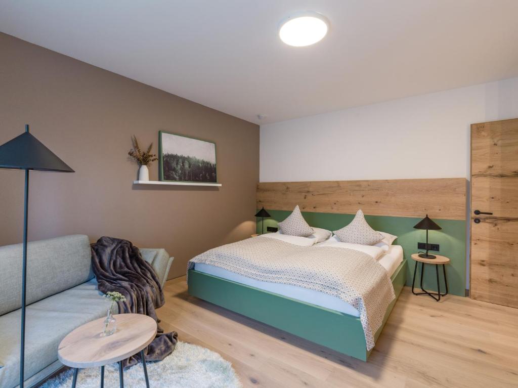 Postel nebo postele na pokoji v ubytování Appartements Retthäusl