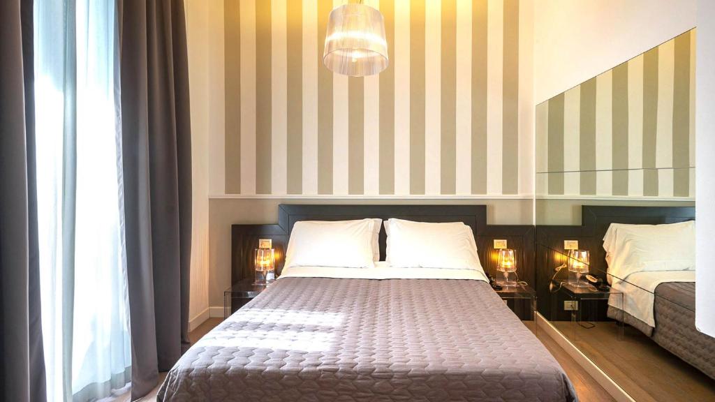 Posteľ alebo postele v izbe v ubytovaní Perla Verde Hotel