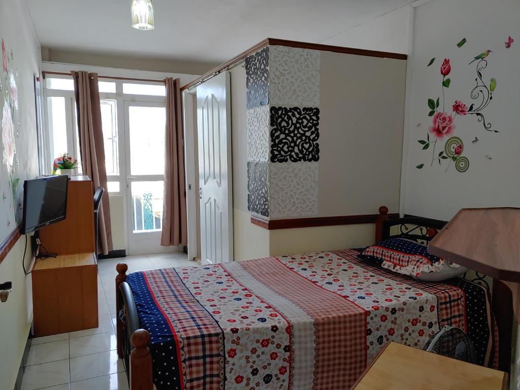 Postel nebo postele na pokoji v ubytování Orient Guesthouse Auberge