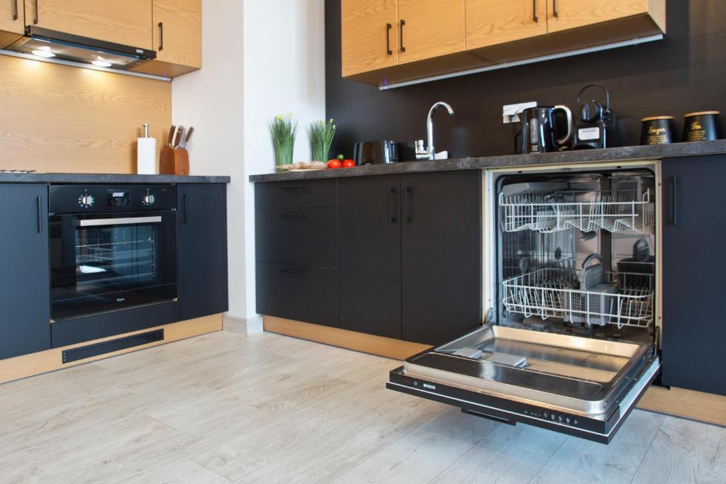Kuchyňa alebo kuchynka v ubytovaní P&O Business Serviced Apartments CYBERNETYKI