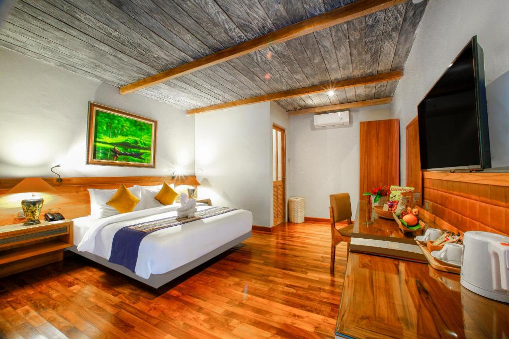 Postel nebo postele na pokoji v ubytování Munduk Heaven Luxury Villas