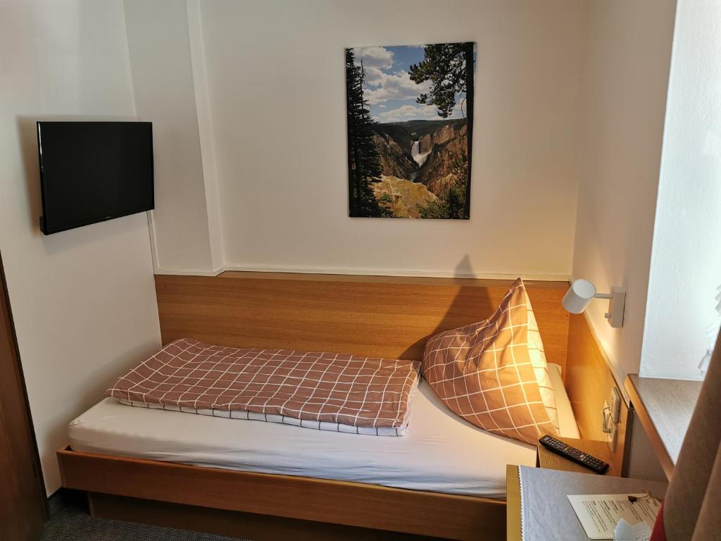 Posteľ alebo postele v izbe v ubytovaní Ferienwohnung Saunahaus