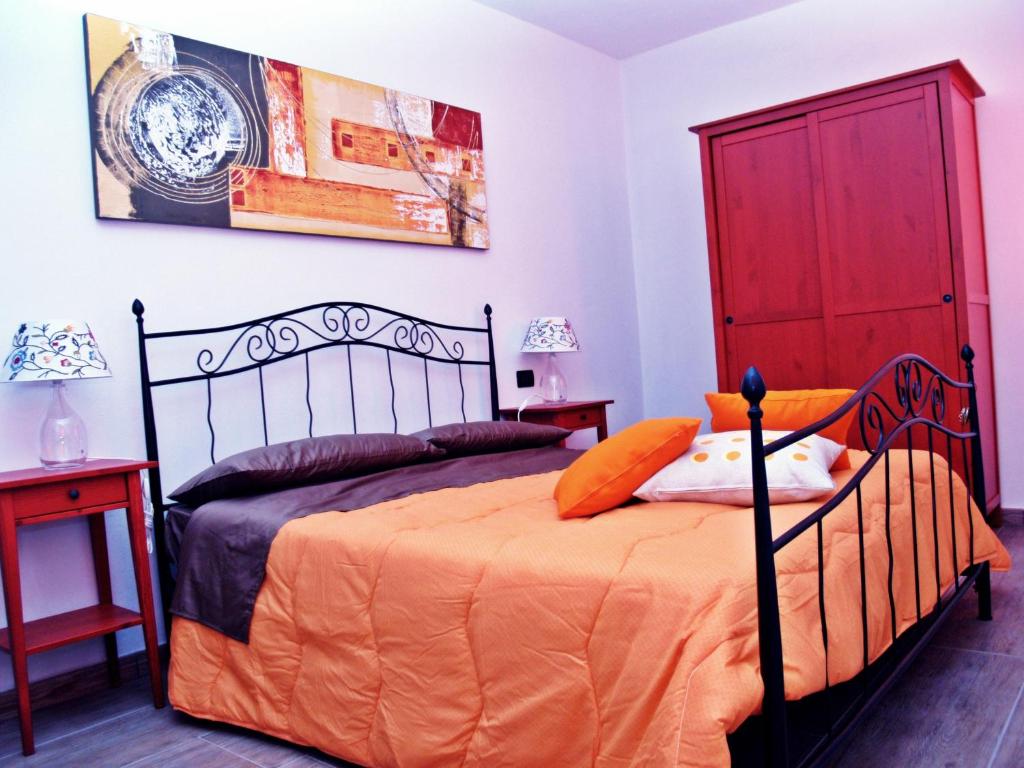 Posteľ alebo postele v izbe v ubytovaní R&B Locanda Le Bighe
