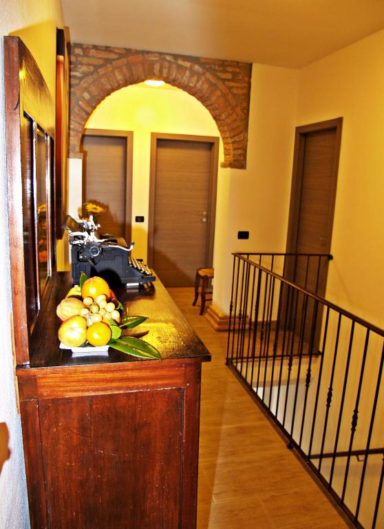 Posteľ alebo postele v izbe v ubytovaní R&B Locanda Le Bighe