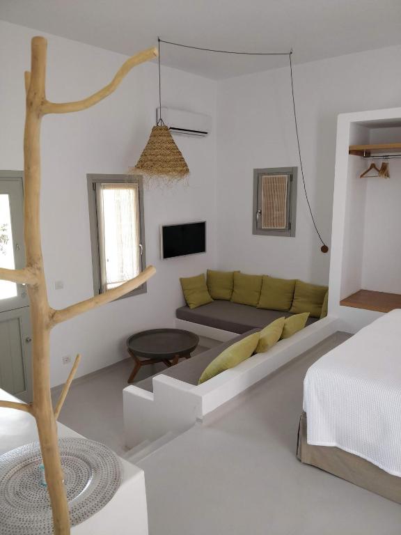 A bed or beds in a room at Psathaki