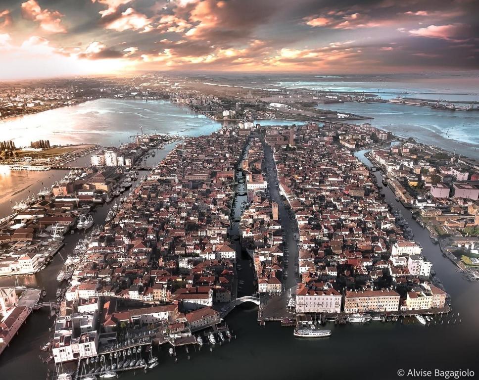 an aerial view of a city next to the ocean at Hotel Clodia in Chioggia