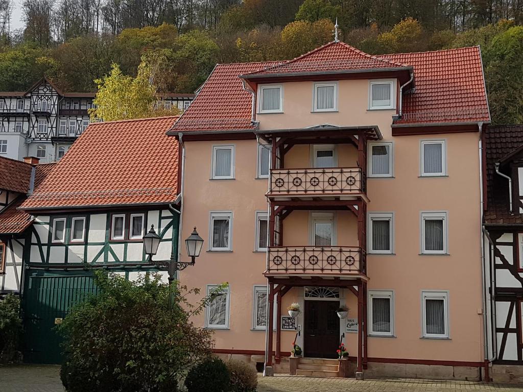 a large house with a red roof at Haus Lieberum in Bad Sooden-Allendorf