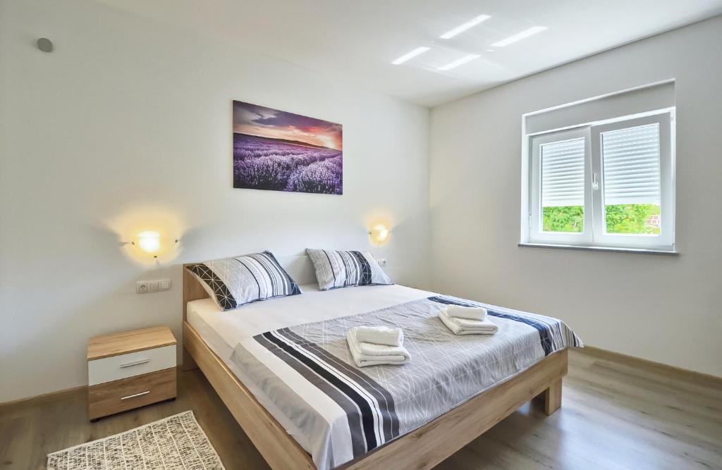 Postel nebo postele na pokoji v ubytování VILLA ALEXANDRIA