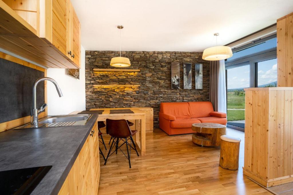 Kuchyň nebo kuchyňský kout v ubytování Natur Resort