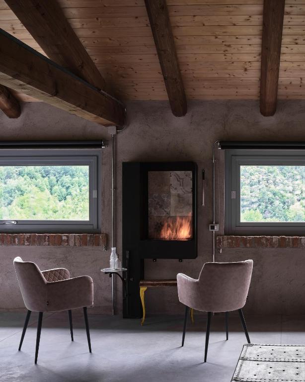 Posezení v ubytování Cascina Facelli - Luxury Country House
