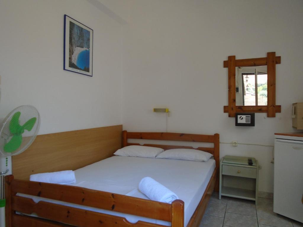 Voodi või voodid majutusasutuse Orfeas Rooms toas