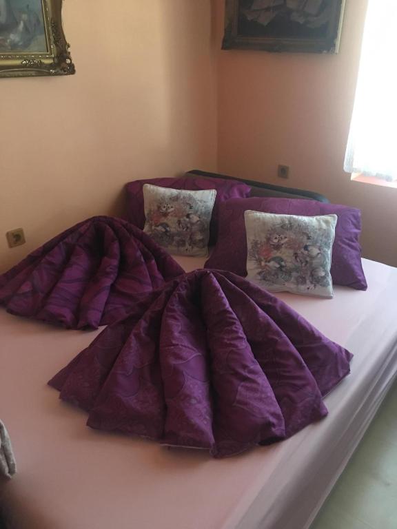 Posteľ alebo postele v izbe v ubytovaní MG Apartman